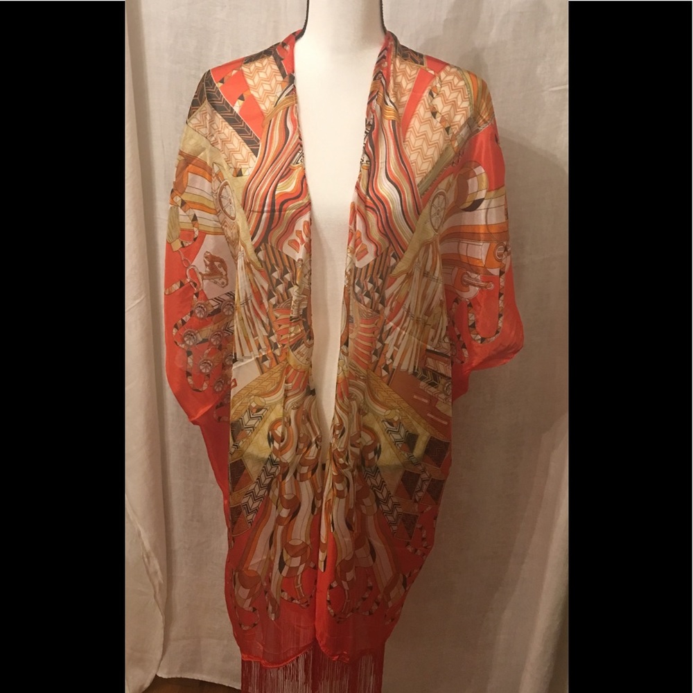 Lovely light shawl w/ arm holes & artful pattern